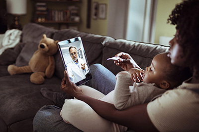 with child on tablet