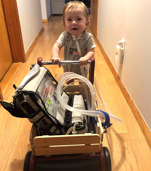 Toddler pushing ventilator