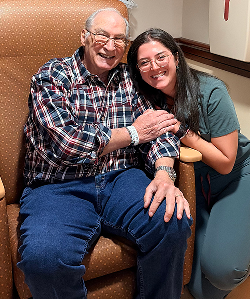 Grateful patient Biz with nurse Jenna