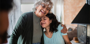 older adult with adult child