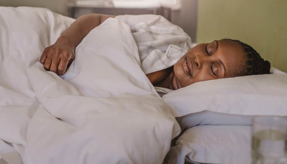 Women sleeping with back pain