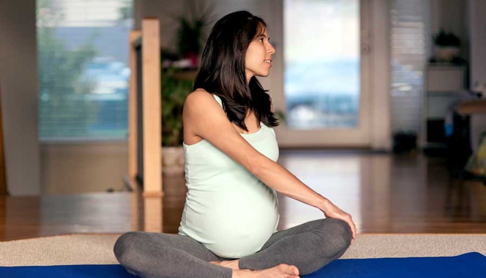 Pregnant women doing yoga