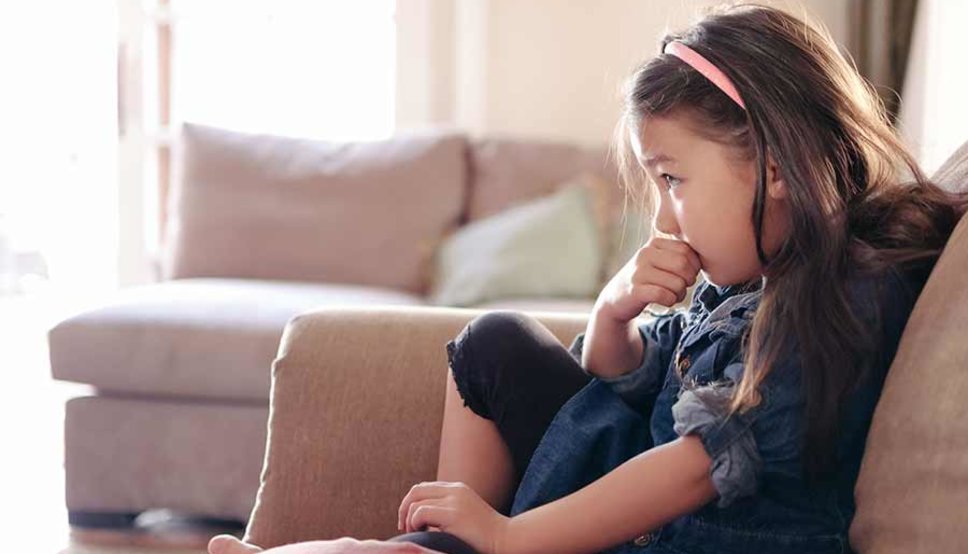 Anxious girl on couch