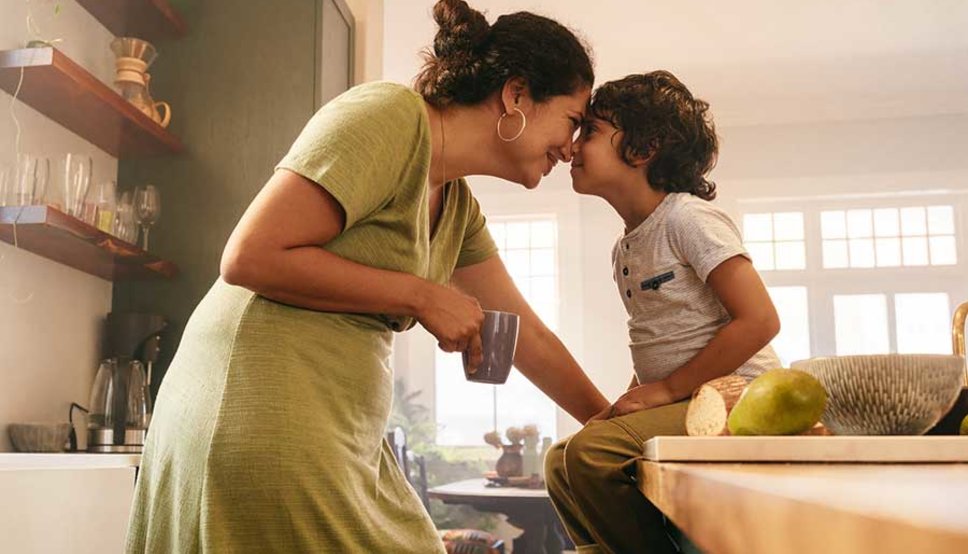 Mother and son in kitchen