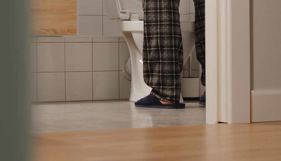 Man going to bathroom