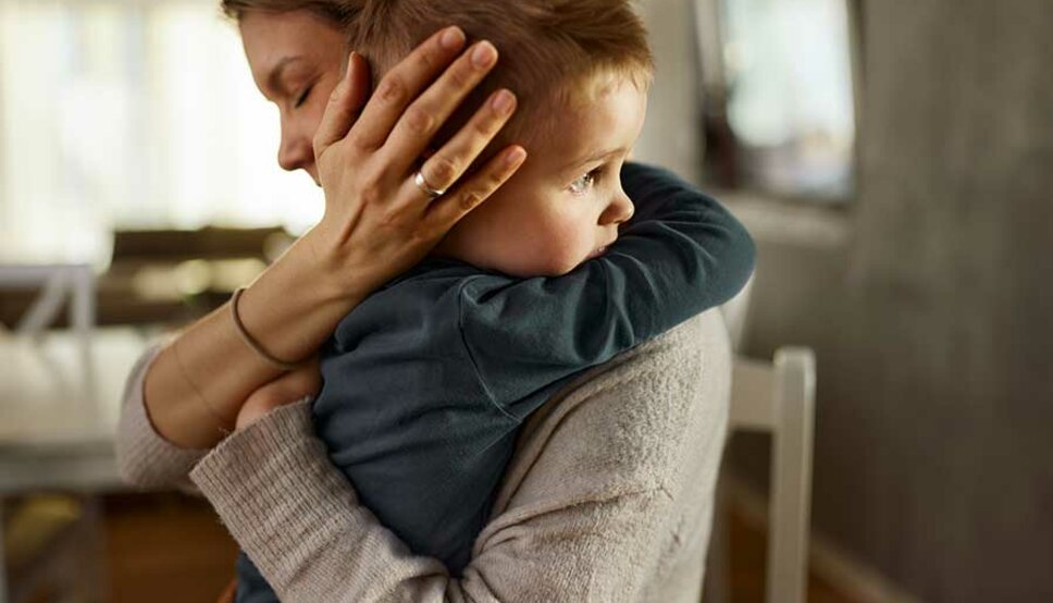 Parent hugging child