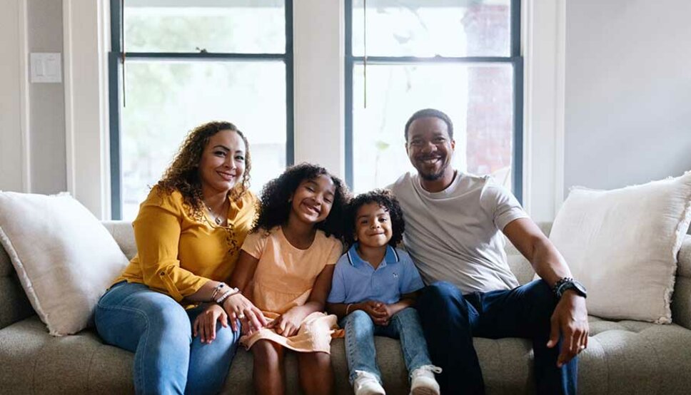 Happy family on couch