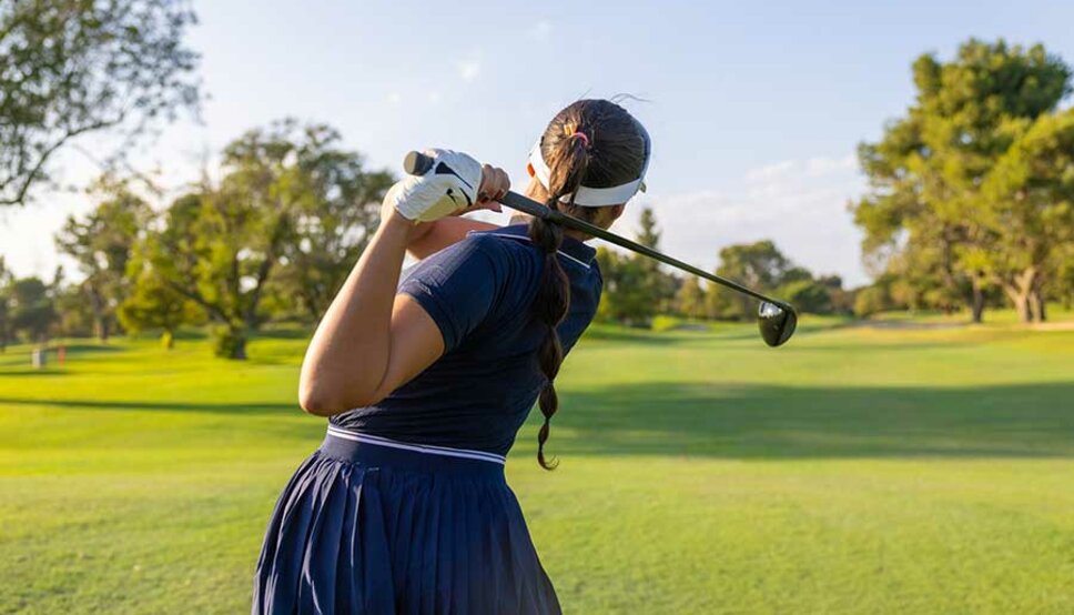 Women golfing