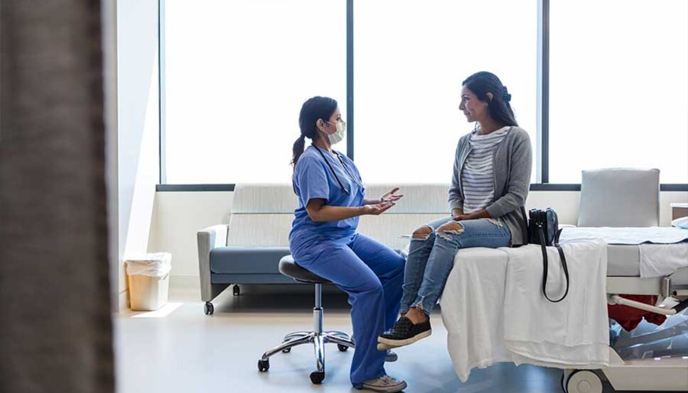 Patient talking to ED provider