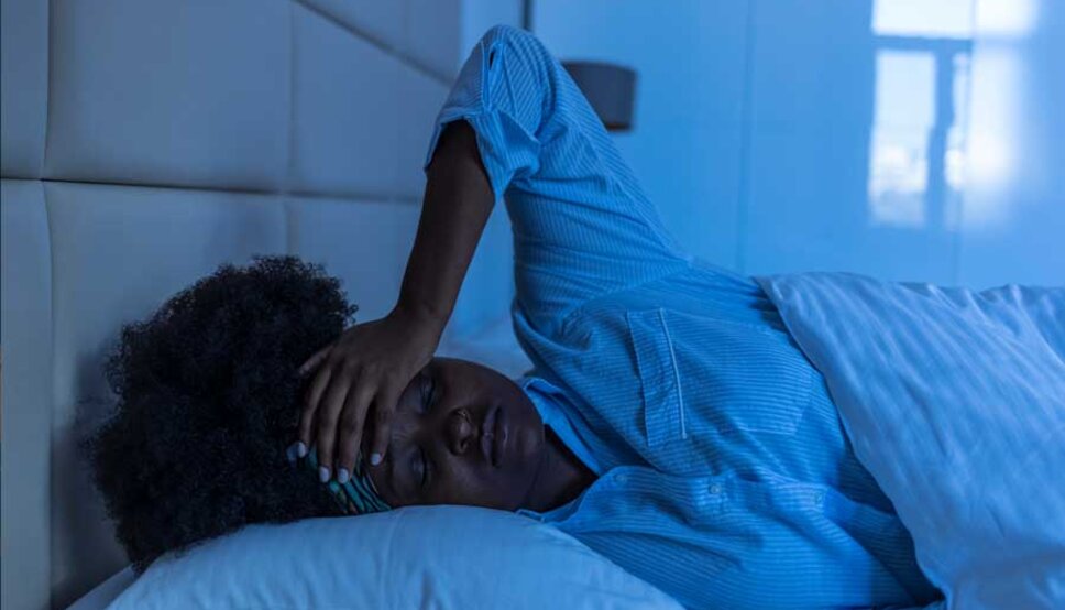 Women with insomnia in bed