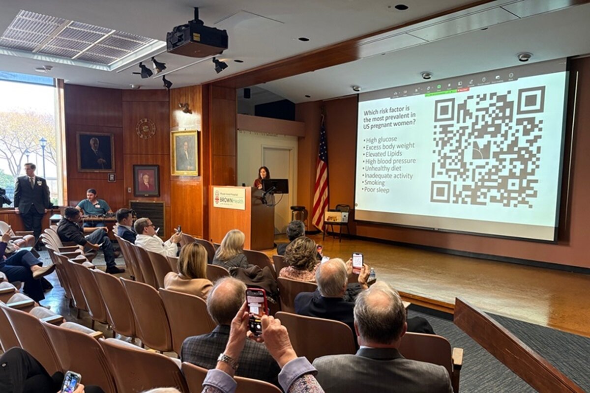 Pheland showing slide with QR code