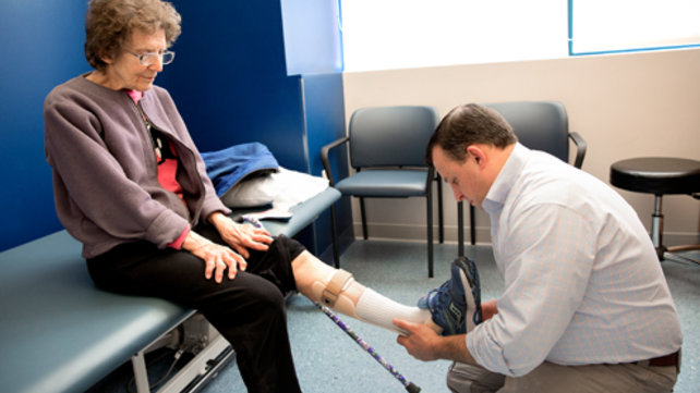 performing physical therapy