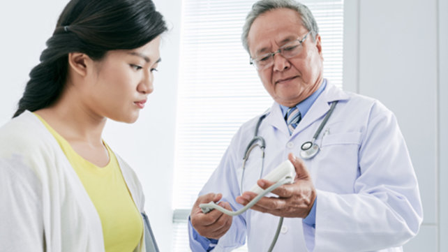 Female patient talking to a doctor