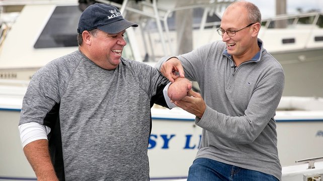 David Tyrrell and Dr. Got on Tyrrell's boat