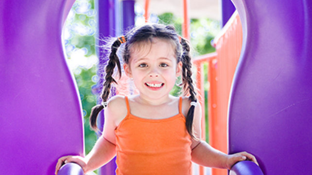 girl on purple slide