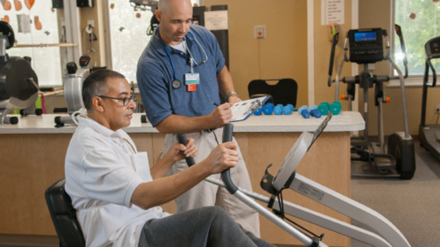 Man on exercise machine