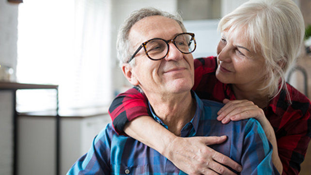 older couple hugging