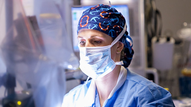 Surgeons performing surgery