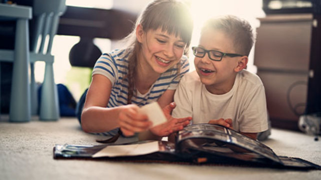 Psychologists and child playing in an office