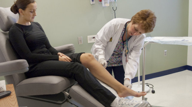 woman getting varicose veins removed