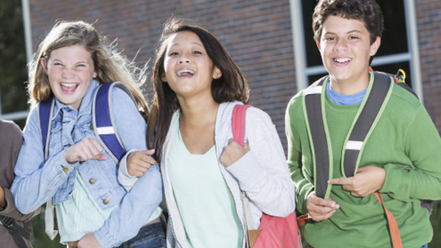 Children wearing backpacks