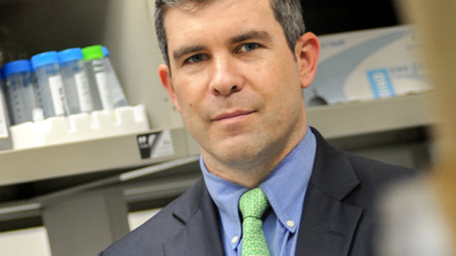 Brett Owens, MD, in his lab.