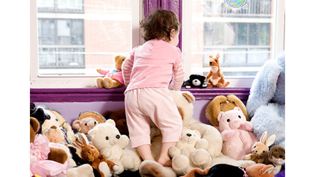 Young child near a window
