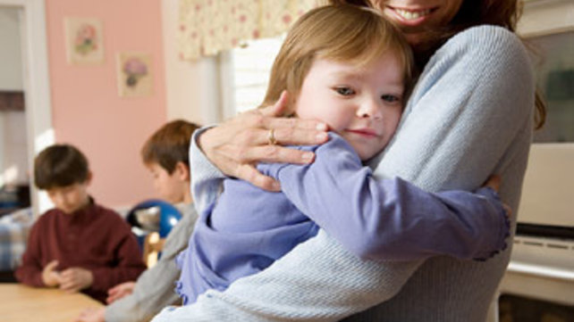 Woman holding a child