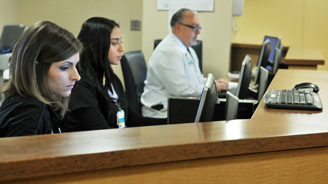 Employees at a help desk