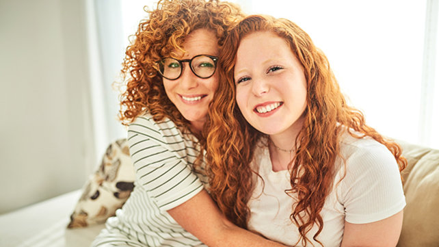A mother and a daughter hugging
