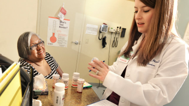 Pharmacist with customer
