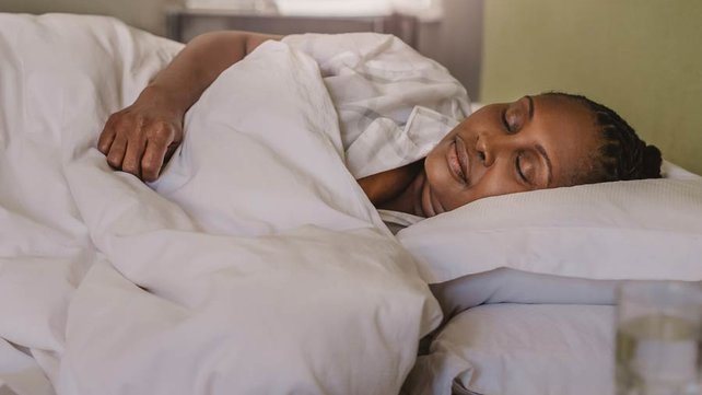 Women sleeping with back pain