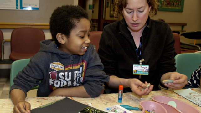 A patient takes part in Healing Arts at Lifespan