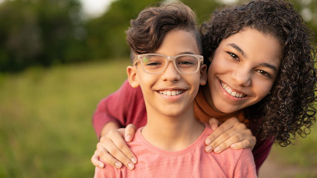 A mother and young teen daughter.