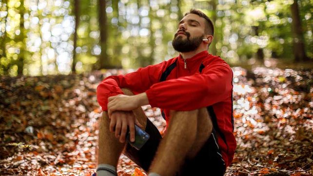 Man in woods relaxed