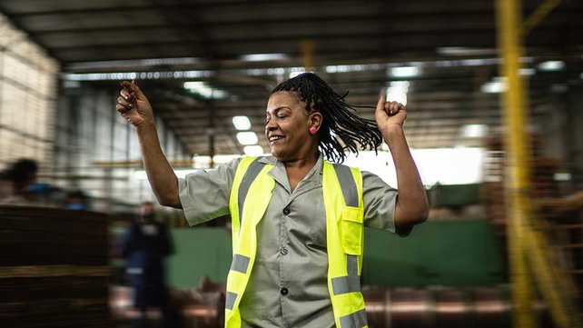 Women dancing at work