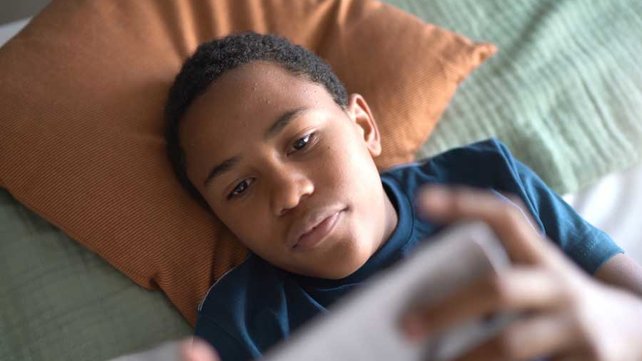 Young boy on cell phone