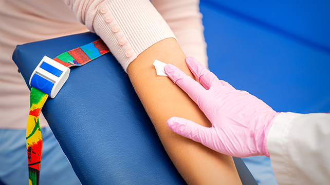 image of phlebotomist and patient arm