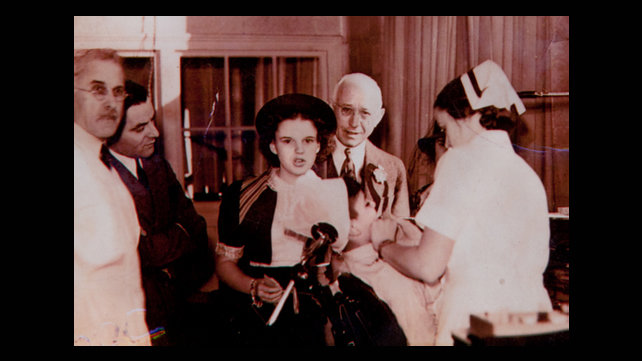 Historical photo of a young Judy Garland visiting Samuels Sinclair Dental Clinic