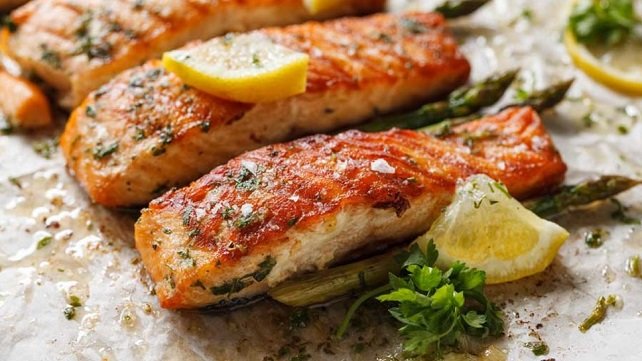 Grilled salmon and lemon on a plate