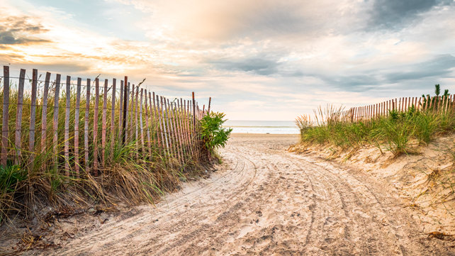 The sandy entrance to a beach in Narragansett Rhode Island