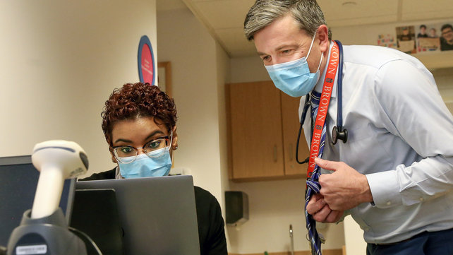 Navigator Angelica Morrobel and Patrick McGann, MD