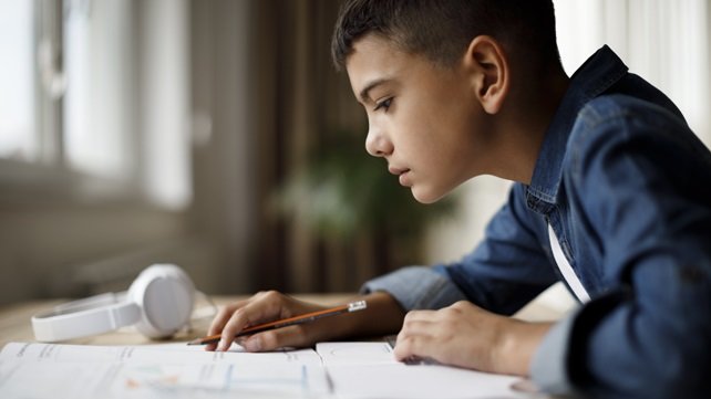 Boy studying at a desk
