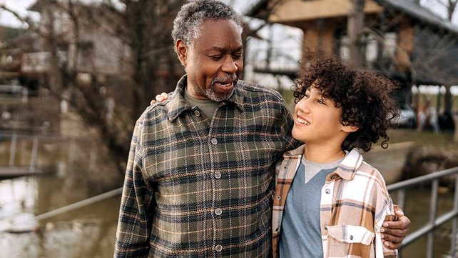 Grandfather and grandson outside