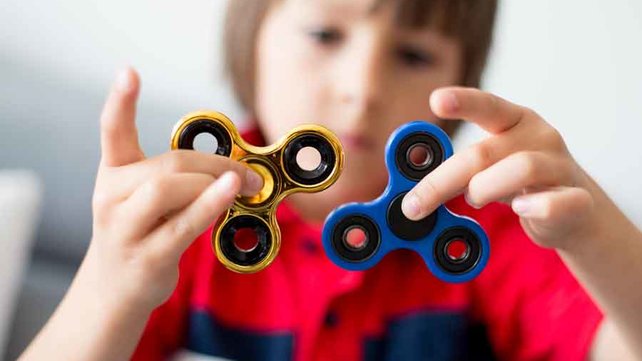 Boy playing with fidget toy
