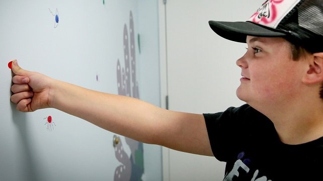 Before you leave, there’s one more task. Choose your favorite animal, add your fingerprint, and leave your mark on our mural. 