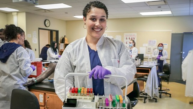 Smiling phlebotomy training student 