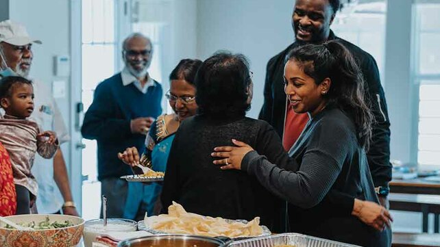 Family getting together for meal