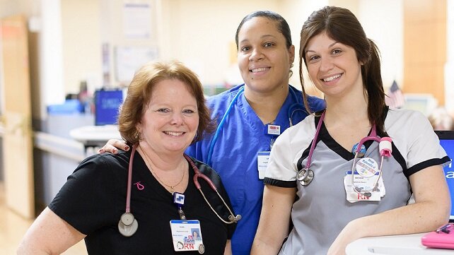 Smiling employees at Morton Hospital in Taunton, MA