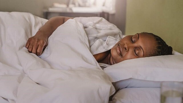 Woman sleeping on her side